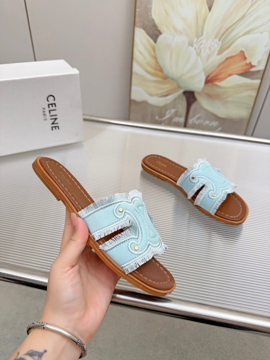 CELINE 26S TRIOMPHE SLIDE SANDALS IN SKY BLUE CANVAS