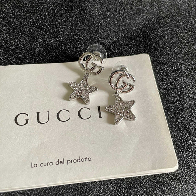 GUCCI 26S DOUBLE G STAR CRYSTAL DROP EARRINGS IN SILVER TONE METAL 627016
