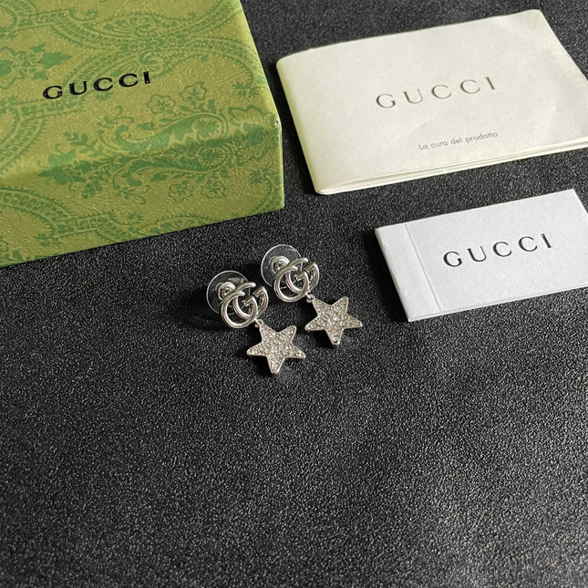 GUCCI 26S DOUBLE G STAR CRYSTAL DROP EARRINGS IN SILVER TONE METAL 627016