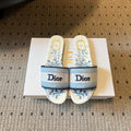 DIOR 26S SLIDES DWAY IN WHITE BLUE EMBROIDERED CANVAS WITH LOGO & FLORAL PRINT FOOTBED
