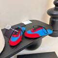 SNEAKER MULES IN BLUE NYLON AND RED SUEDE