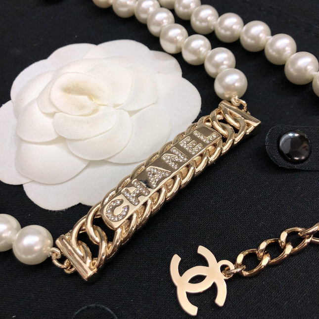 CHANEL 25S CHAIN BELT IN WHITE PEARL 615991