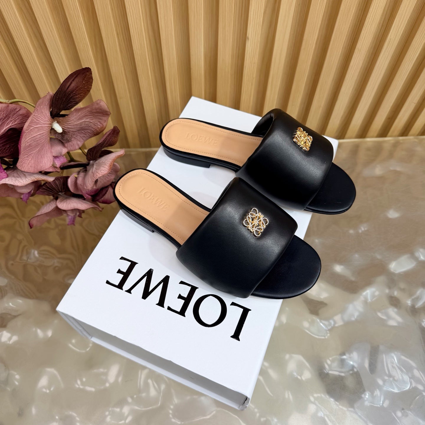 LOEWE 26S SLIDE SANDALS IN BLACK ANAGRAM PADDED LAMBSKIN