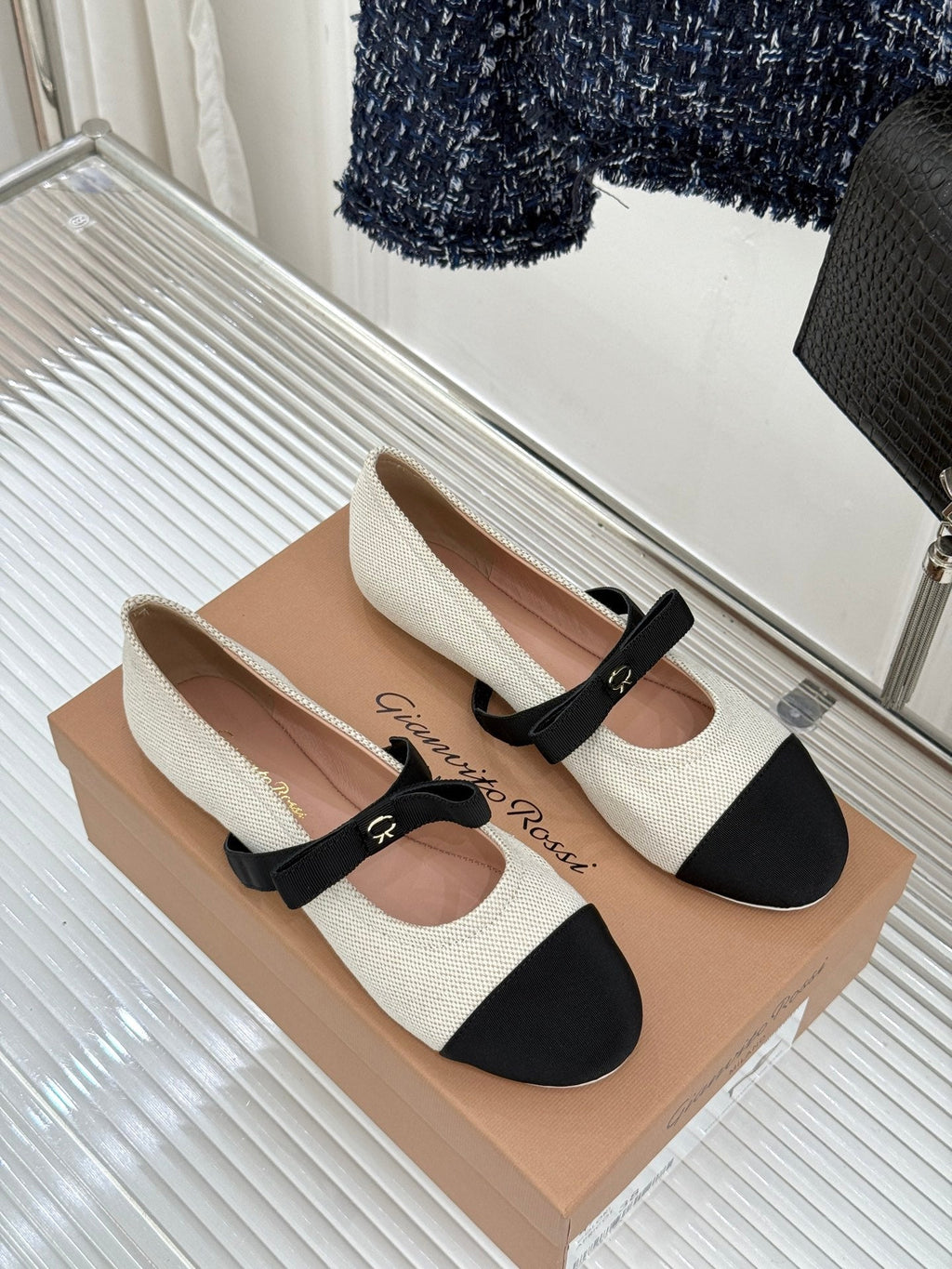 GIANVITO ROSSI 26S MARY JANE FLATS IN BLACK AND WHITE FABRIC