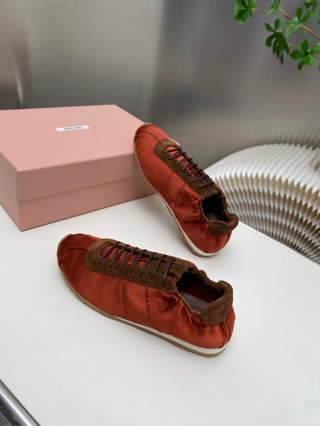 MIUMIU 26S SNEAKERS IN RUST RED PLUME SATIN