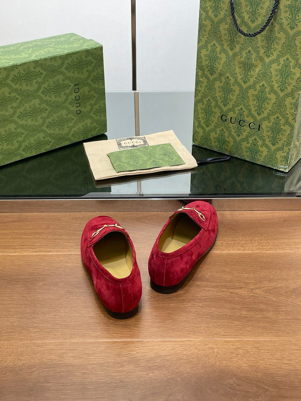 HORSEBIT LOAFER IN CHERRY RED SUEDE WITH GOLD HARDWARE