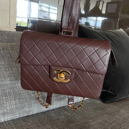 CHANEL 26S QUILTED FLAP BACKPACK 28 IN BURGUNDY RED LAMBSKIN GOLD HARDWARE