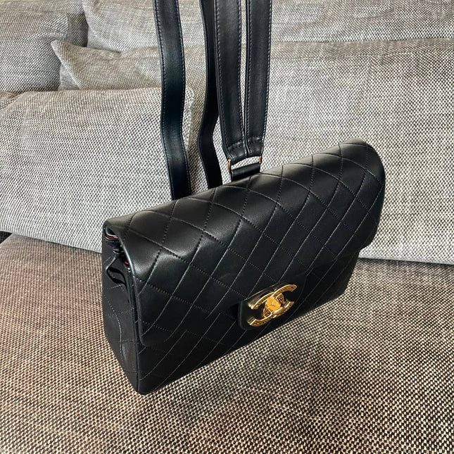 CHANEL 26S QUILTED FLAP BACKPACK 28 IN BLACK LAMBSKIN GOLD HARDWARE