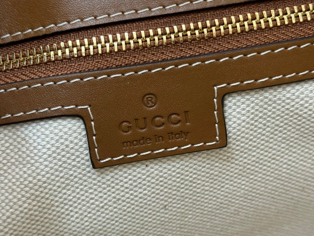 73 MEDIUM BUCKET BAG 27.5 IN BROWN SMOOTH CALFSKIN