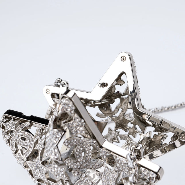 CHANEL 26S STAR CLUTCH MINI 13 IN SILVER CRYSTAL EMBELLISHED METAL