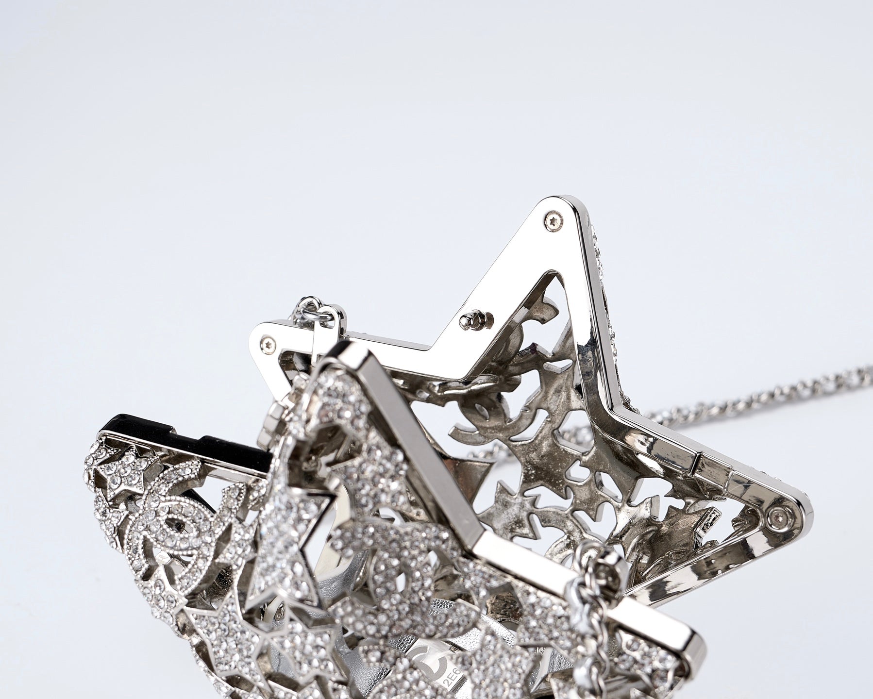 CHANEL 26S STAR CLUTCH MINI 13 IN SILVER CRYSTAL EMBELLISHED METAL