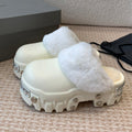 PLATFORM MULES IN BEIGE RUBBER MIX RABBIT FUR SILVER HARDWARE