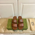 GG SANDAL WITH ROUND INTERLOCKING G IN CARAMEL BROWN CALFSKIN
