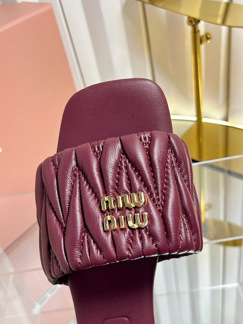 MIUMIU 26S MATELASSE SLIDES IN BURGUNDY RED CALFSKIN GOLD HARDWARE