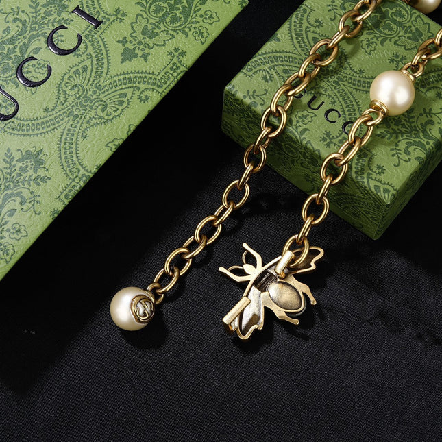 GUCCI 26S BEE PEARL CHAIN NECKLACE IN GOLD TONE METAL 615893