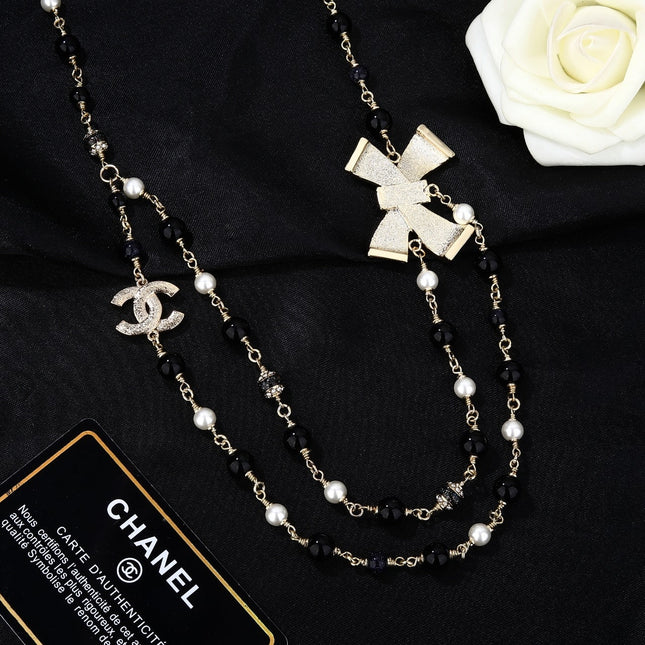 CHANEL 25S CHAIN BELT IN BLACK AND WHITE PEARL 614285