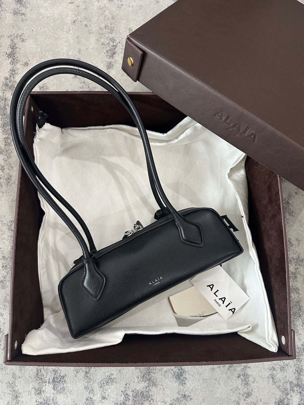LE TECKEL SMALL BAG 27 IN BLACK GOATSKIN