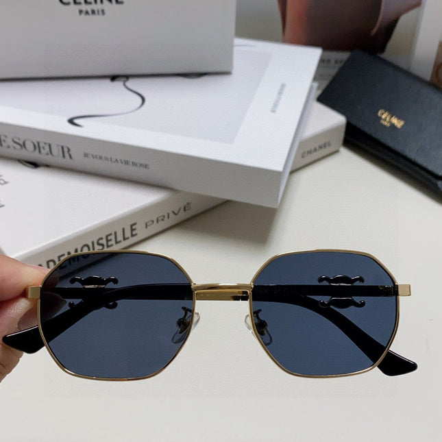 TRIOMPHE SUNGLASS 497823 IN GOLD METAL BLACK LENSES