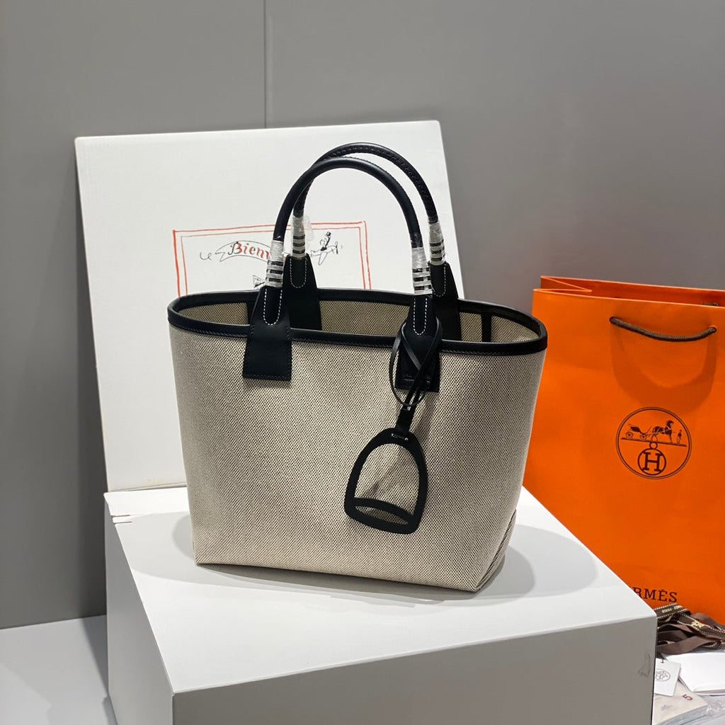 STEEPLE 28 BAG IN OFF-WHITE H CANVAS AND BLACK SWIFT CALFSKIN