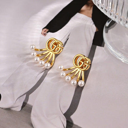 GUCCI 26S DOUBLE G LOGO PEARL FAN DROP EARRINGS IN GOLD TONE METAL 633779