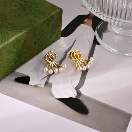GUCCI 26S DOUBLE G LOGO PEARL FAN DROP EARRINGS IN GOLD TONE METAL 633779