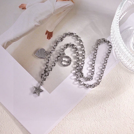 GUCCI 26S INTERLOCKING G LOGO STAR HEART MULTI CHARM CHAIN BRACELET IN SILVER TONE METAL