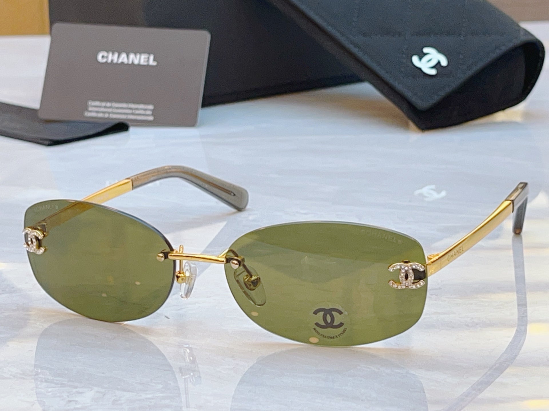 CHANEL RECTANGLE SUNGLASSES IN METAL 941998