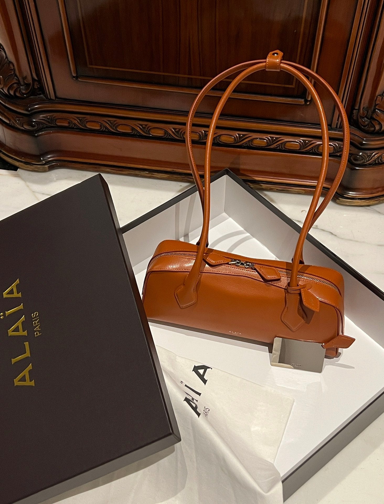 LE TECKEL MEDIUM BAG 33 IN BRONZE ORANGE GOATSKIN