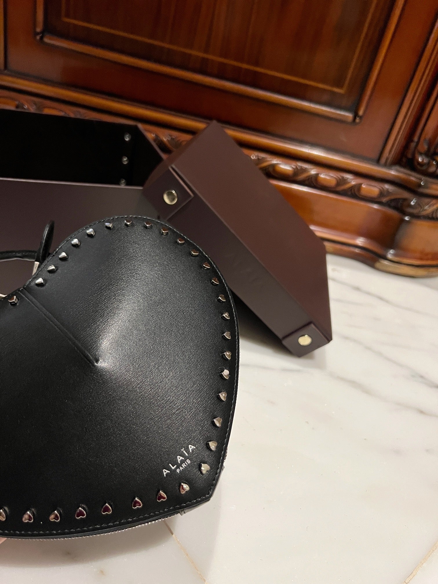 LE COEUR BAG 21 IN BLACK CALFSKIN WITH STUDDED HEART