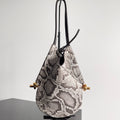 SMALL SOLSTICE 30 IN SNAKE PATTERN CALFSKIN