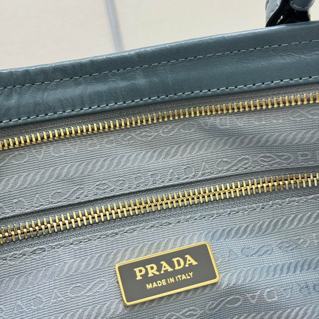 PRADA 25S LUX SOFT BAG 42 IN BLUE GLOSSY CALFSKIN GOLD HARDWARE