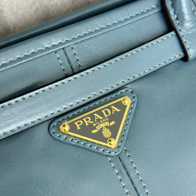 PRADA 25S LUX SOFT BAG 42 IN BLUE GLOSSY CALFSKIN GOLD HARDWARE