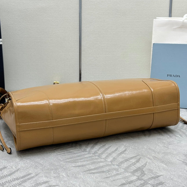 PRADA 25S LUX SOFT BAG 42 IN CARAMEL GLOSSY CALFSKIN GOLD HARDWARE