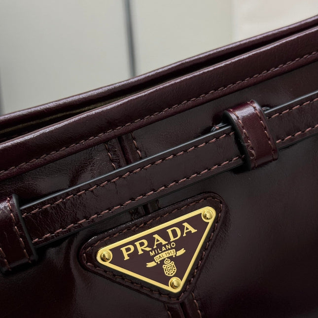 PRADA 25S BONNIE SMALL SHOULDER BAG 26 IN BURGUNDY GLOSSY CALFSKIN GOLD HARDWARE