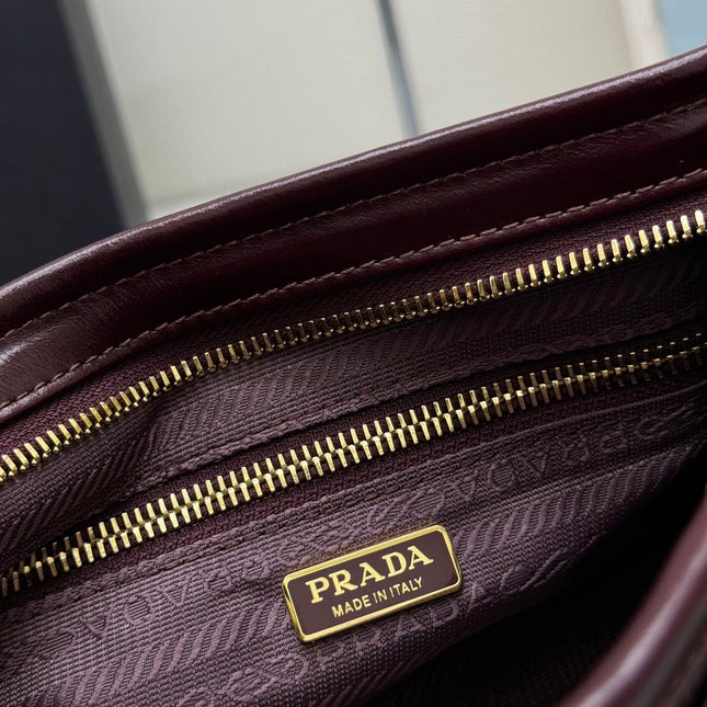 PRADA 25S BONNIE SMALL SHOULDER BAG 26 IN BURGUNDY GLOSSY CALFSKIN GOLD HARDWARE