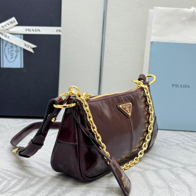 PRADA 25S RE-EDITION 2002 MEDIUM SHOULDER BAG 26 IN BURGUNDY CALFSKIN GOLD HARDWARE