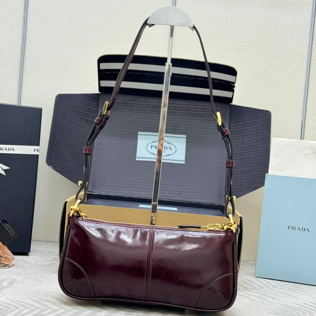 PRADA 25S RE-EDITION 2002 MEDIUM SHOULDER BAG 26 IN BURGUNDY CALFSKIN GOLD HARDWARE
