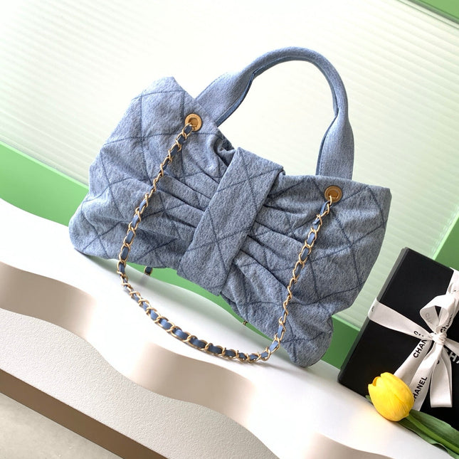 CHANEL 25S MAXI BOW BAG 38 IN BLUE DENIM WITH GOLD HARDWARE