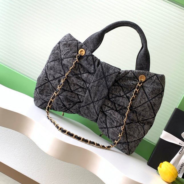 CHANEL 25S MAXI BOW BAG 38 IN DARK GREY DENIM WITH GOLD HARDWARE