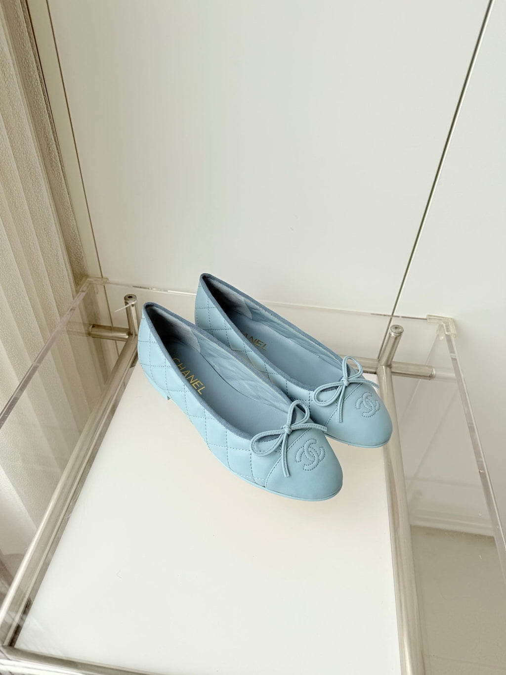 CHANEL 26S BALLET FLATS IN LIGHT BLUE QUILTED CALFSKIN WITH BOW