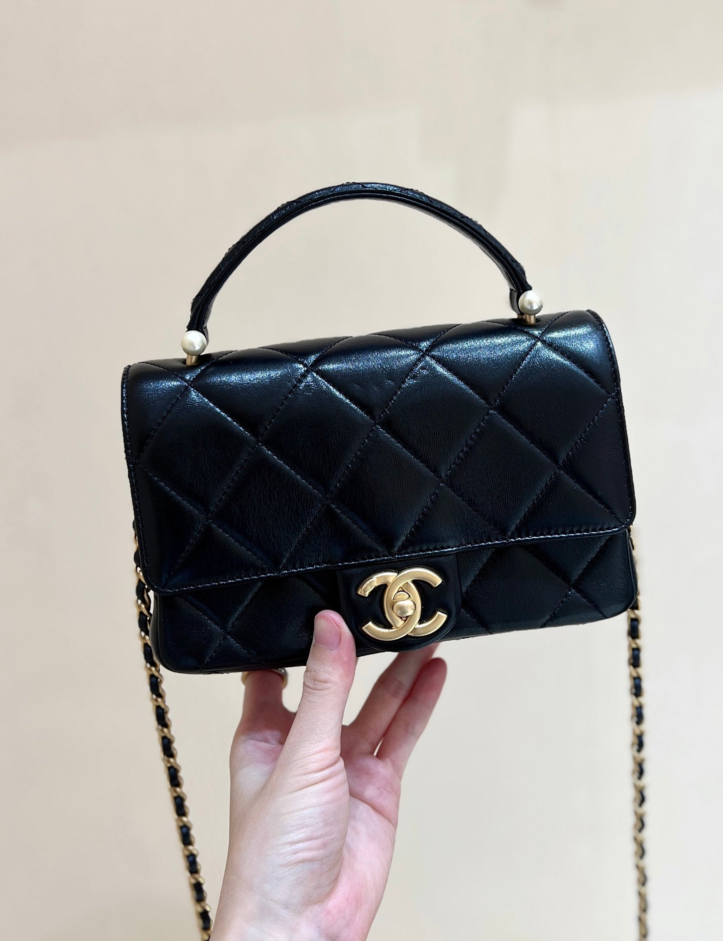 PEARL LIMITED EDITION FLAP BAG WITH HANDLE 20 IN BLACK LAMBSKIN