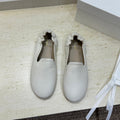 THE ROW 26S BALLET FLATS IN IVORY WHITE CALFSKIN