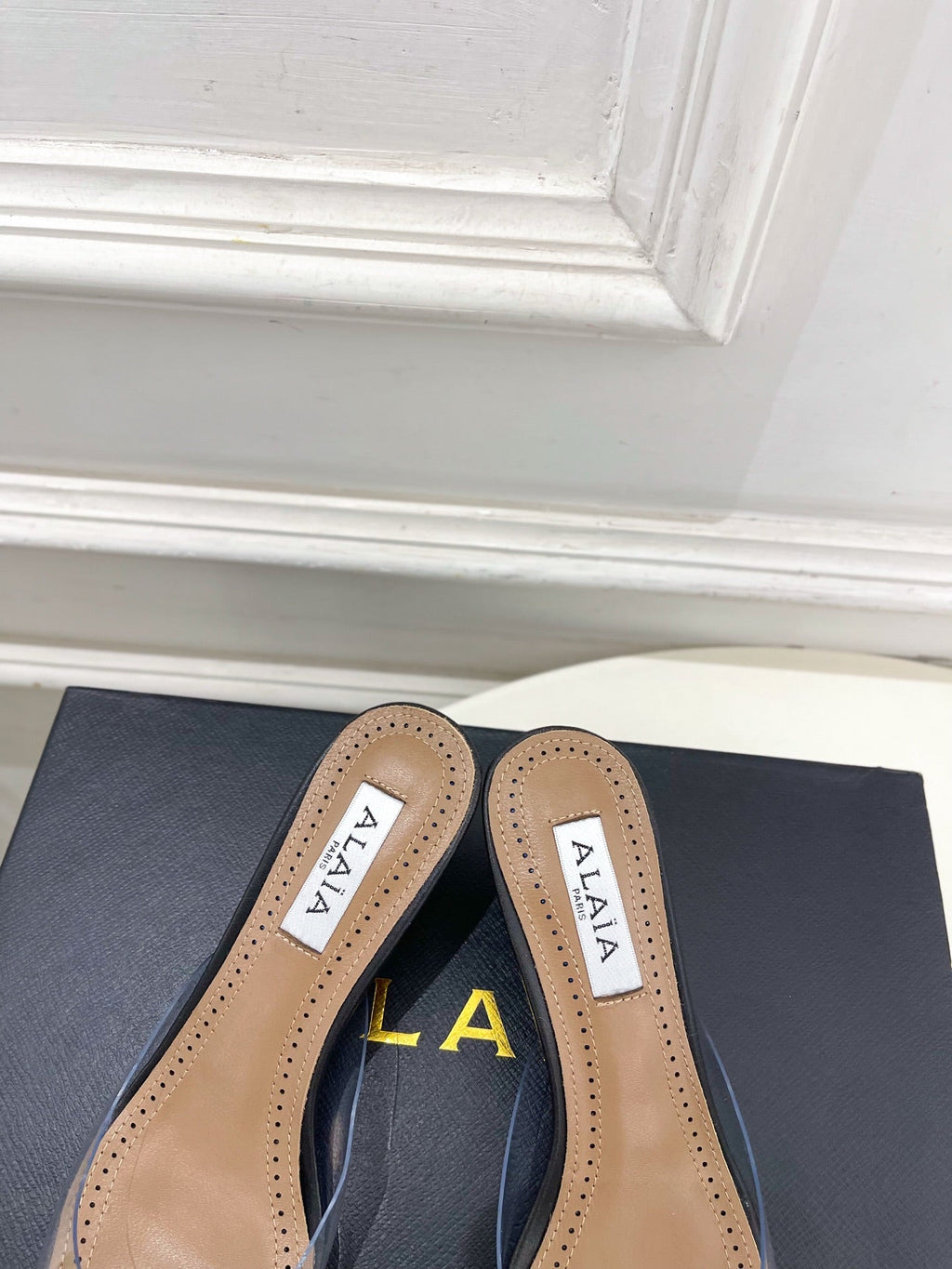 ALAIA 26S MULE HEELS 55 MM IN BLACK LAMBSKIN AND TRANSPARENT PVC