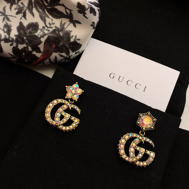 GUCCI 26S DOUBLE G LOGO MULTICOLOR CRYSTAL DROP STATEMENT EARRINGS IN AGED GOLD TONE METAL 629027